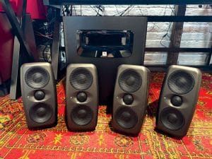 The JBL LSR310S and four iLoud MTM MKII speakers ready for install.